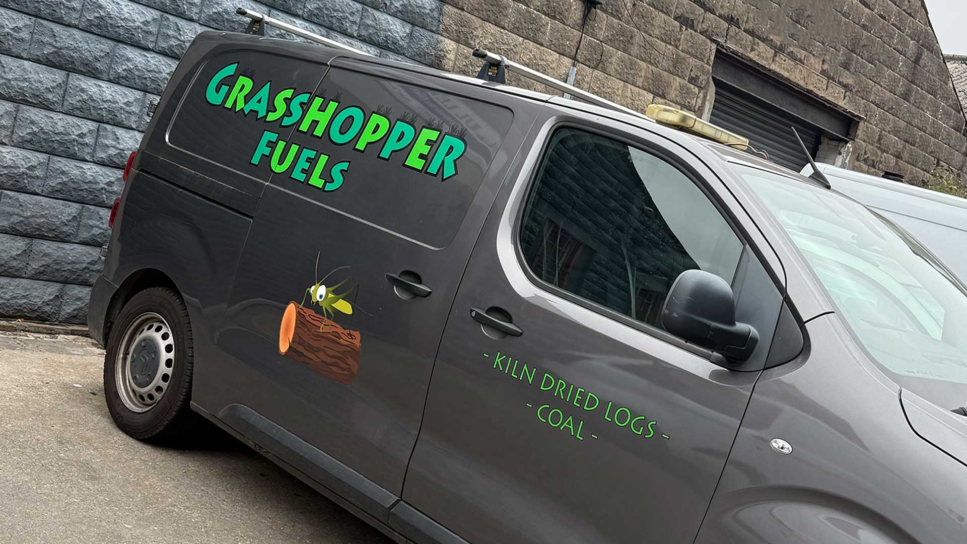 The Grasshopper Fuels delivery van, supplying kiln-dried logs and coal across the Isle of Man